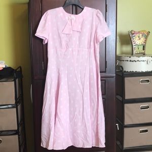 Pink and white 40’s style dress.
